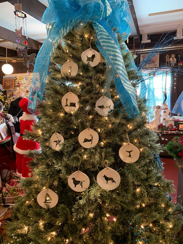 Christmas tree decorated with sea shells 