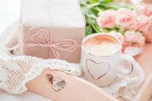 Mothers day concept - coffee present and roses copy space