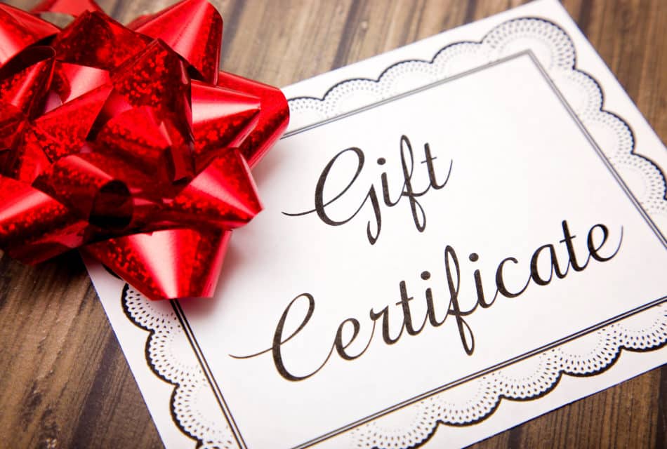 Picture of a paper Gift Certificate with a red bow