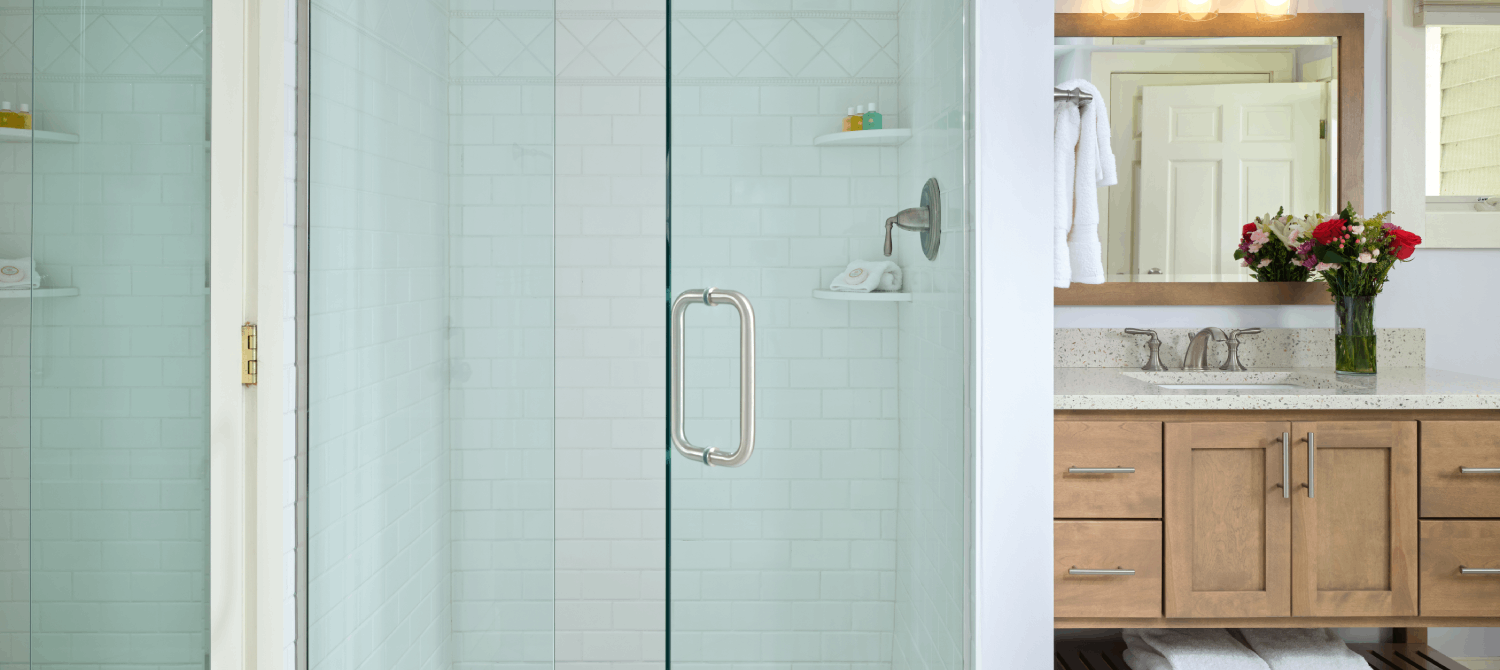 A photo of luxury bathroom with glass inclosed shower