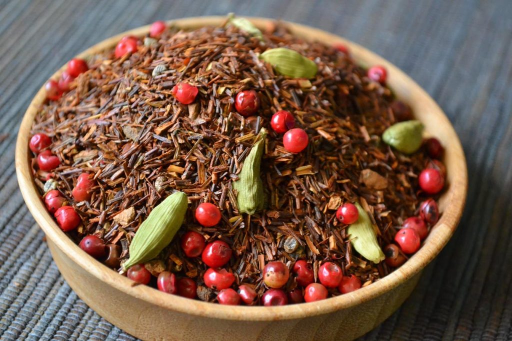 Loose tea in a ball with red berries